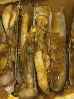 Una foto de Navajas en salsa picante