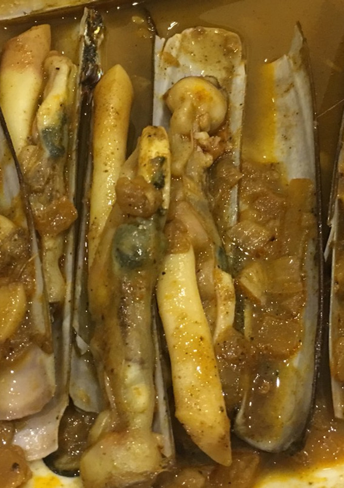 Una foto de Navajas en salsa picante