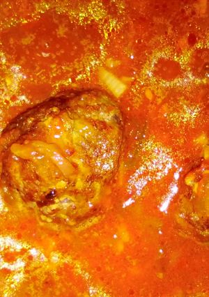 A picture of Meatballs in tomato sauce.
