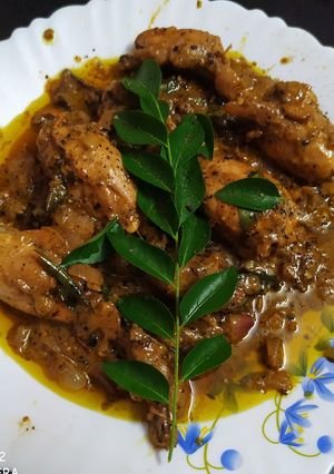 A picture of Black pepper and curry leaves chicken.