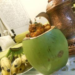 Masala Prawns stuffed in Fresh Tender Coconut A picture of Masala Prawns stuffed in Fresh Tender Coconut.