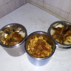 A picture of White sliced yam and tomato sauce.