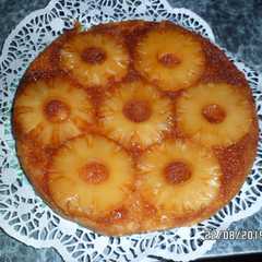 Una foto de Torta invertida borracha con ananá