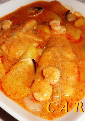 Una foto de Rape con patatas, almejas y gambitas