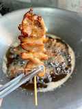 “หมูทอดเสียบไม้”
