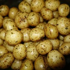 Garlic buttered baby potatoes A picture of Garlic buttered baby potatoes.