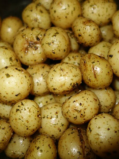 A picture of Garlic buttered baby potatoes.