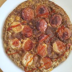 A picture of Omelette with sausage and corn.