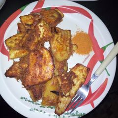 A picture of Fried sweet potato with eggs.