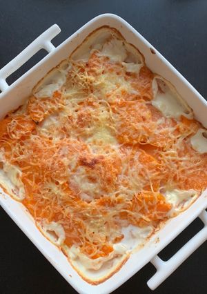 Une photo de Gratin de patates douces et pommes de terre à la crème de coco