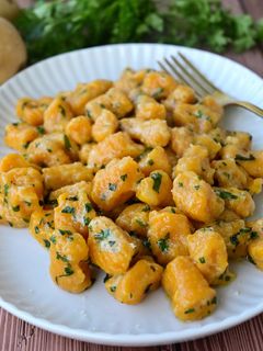 Foto di Gnocchi zucca e patate alle erbe