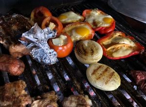 Una foto de Tomate (locos Por el asado)