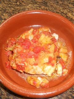 Una foto de Lomos de bacalao con pisto