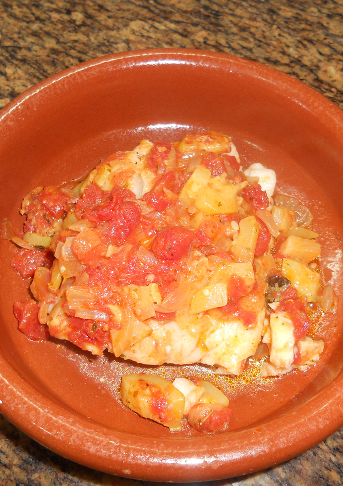Una foto de Lomos de bacalao con pisto