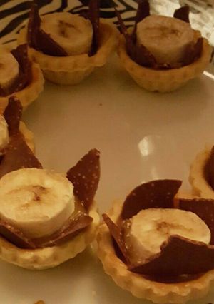 A picture of Banoffee and black thorn tartlett.