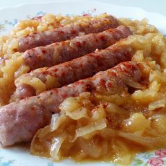 A picture of Sausages In Apple & Onion Sauce.