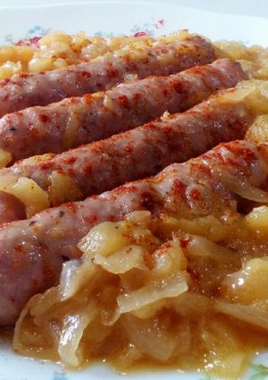 A picture of Sausages In Apple & Onion Sauce.