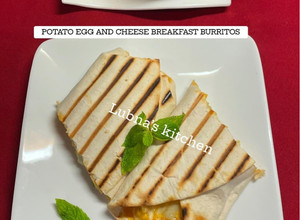 A picture of POTATO EGG AND CHEESE BREAKFAST BURRITOS:.