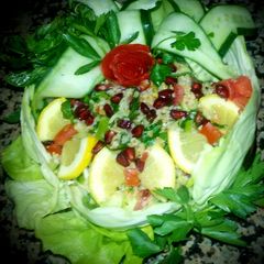 Syrian tabbouleh with cabbage as a dish to put the tabbouleh mix A picture of Syrian tabbouleh with cabbage as a dish to put the tabbouleh mix.