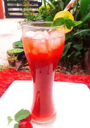 A picture of Cherry Red Plums and Apple Mojito.