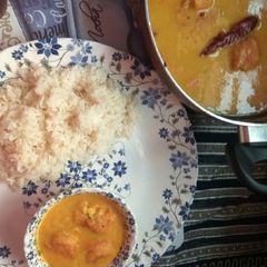 A picture of Urad kadhi with rice.