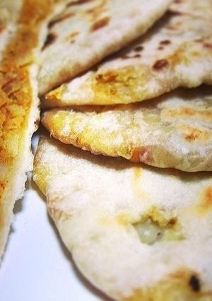 A picture of Aloo Paratha / Spicy Potato Stuffed Indian Flatbread.