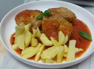 Foto principal de Chayotas rebozadas en salsa de tomate casera