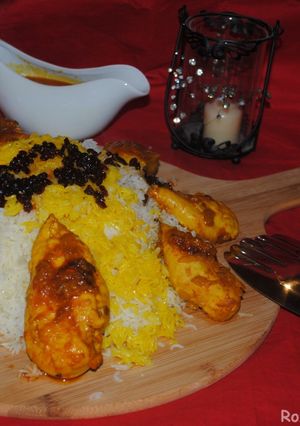 A picture of Persian Barberries rice with saffron chicken (Zereshk polow BA morgh).