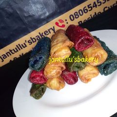 A picture of Colourful spring rolls.