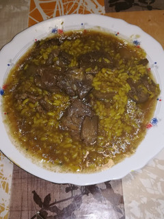 Una foto de Arroz con solomillo en la olla GM g plato de aprovechamiento