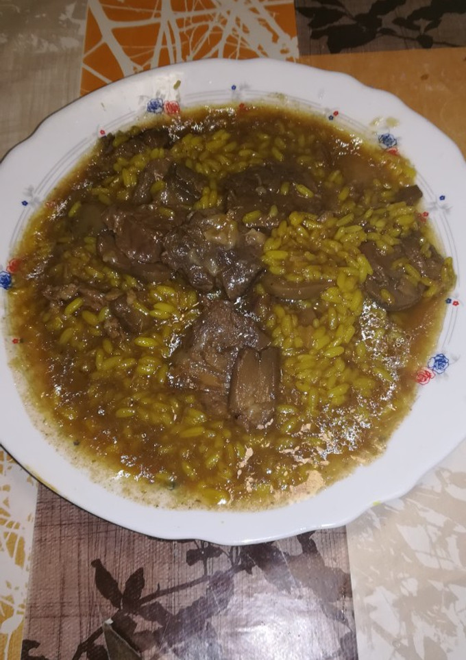 Una foto de Arroz con solomillo en la olla GM g plato de aprovechamiento