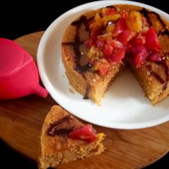 A picture of Ghee Residue Cake with Melon Orange Compote.
