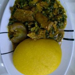 A picture of Okra soup and eba.