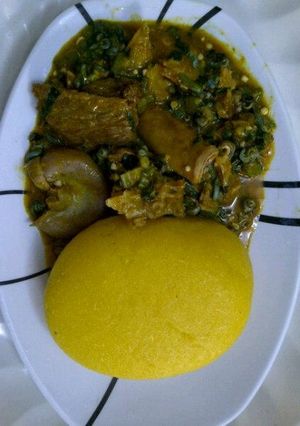 A picture of Okra soup and eba.