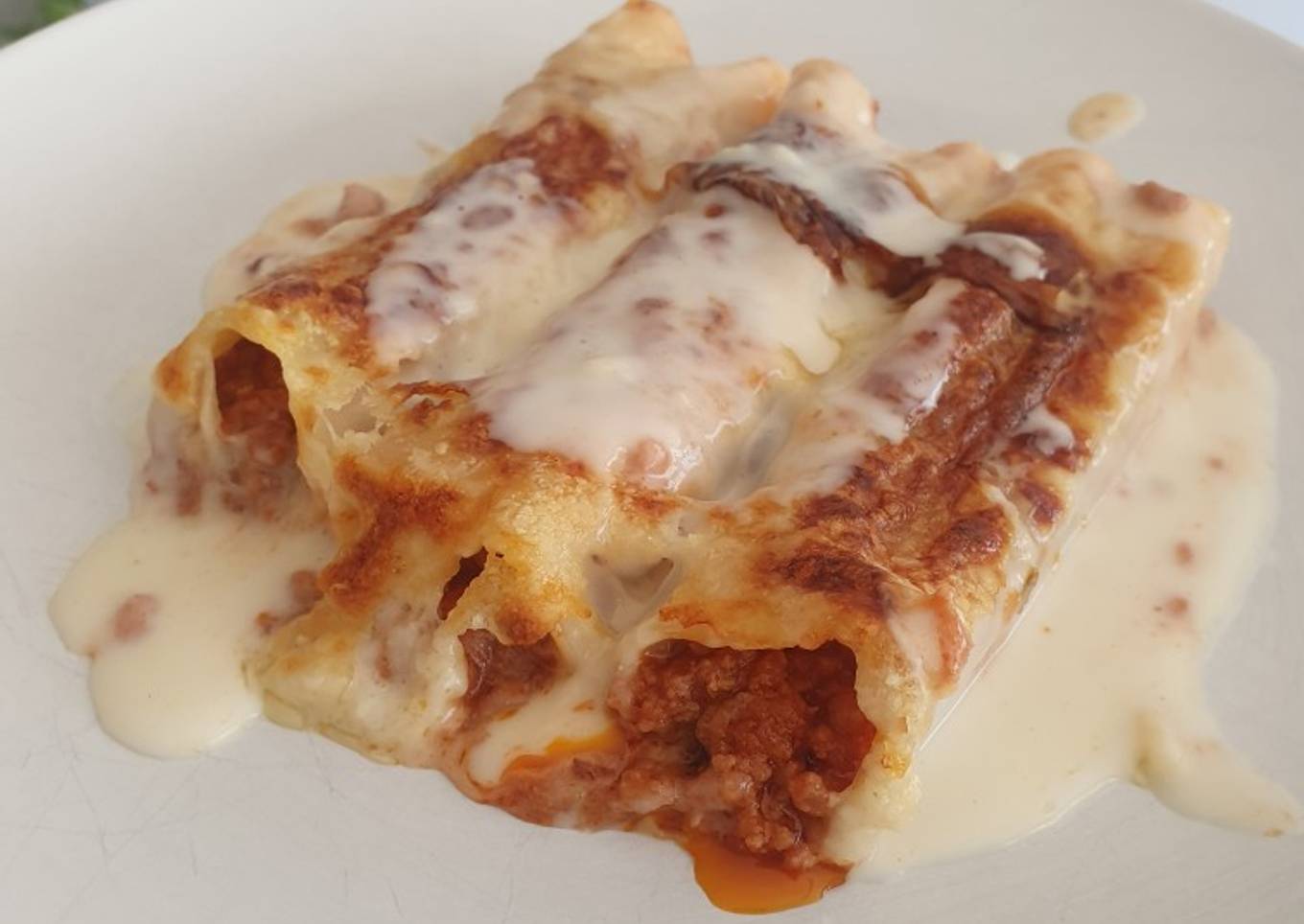 Canelones de carne picada con tomate gratinados