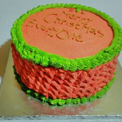 A picture of Christmas Themed Cake.