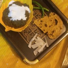A picture of Sarson ka Saag With Makki ki Roti.