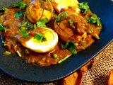 Boiled egg curry with peas