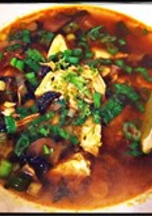 A picture of Thai Chicken and Mushroom Broth.