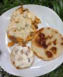 Huevos revueltos (carne desmechada, tomate, queso)