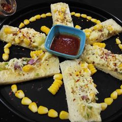 A picture of Cheese corn garlic bread.
