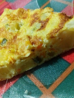 Una foto de Tortilla de zapallitos, papa y zanahoria