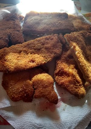 Una foto de Milanesas de pollo con papas fritas