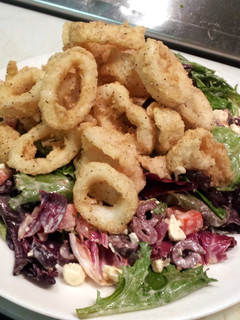 A picture of Fried Calamari Salad.