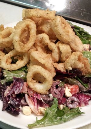 A picture of Fried Calamari Salad.