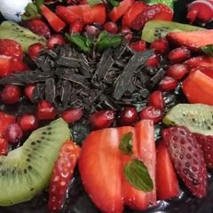 A picture of Orange caramel choco fresh fruit cake.