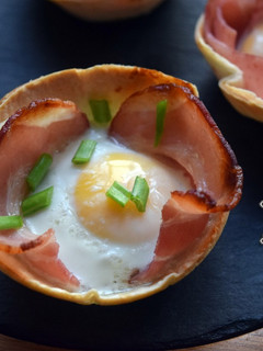 Una foto de Tartaletas de Bacon, queso y huevo