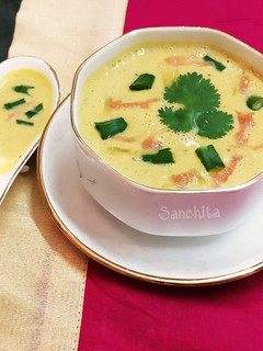 A picture of Creamy Pumpkin and Chive soup.