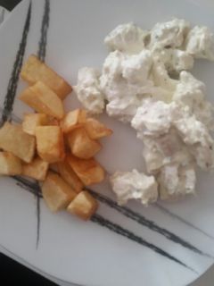 Una foto de Pollo con queso a las finas hierbas