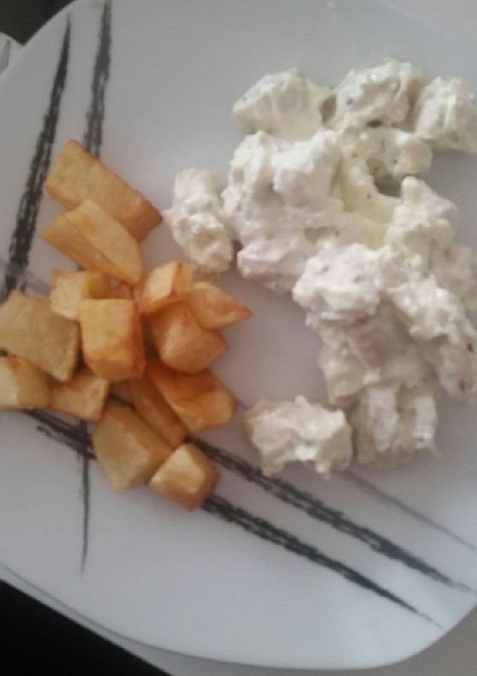 Una foto de Pollo con queso a las finas hierbas